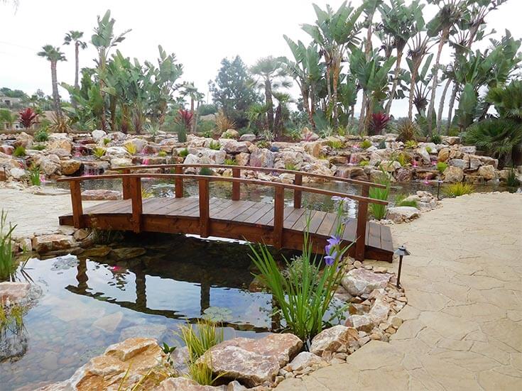 How To Incorporate A Pond In Your Backyard Landscaping